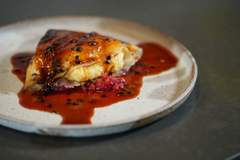 Passionfruit Crepe Brulee with Crushed Raspberries